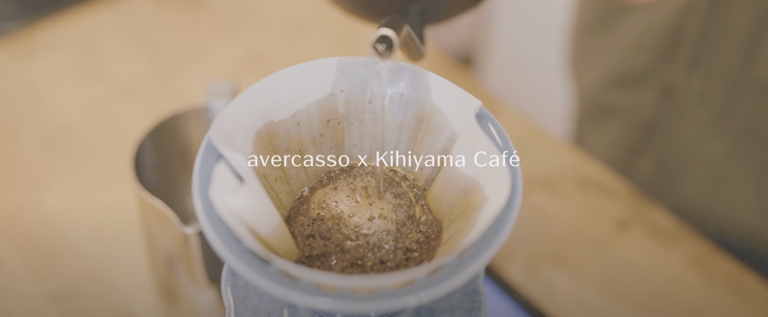 During the pour-over process, the coffee grounds bloom like a volcano, showcasing the freshness and quality of the specialty beans.