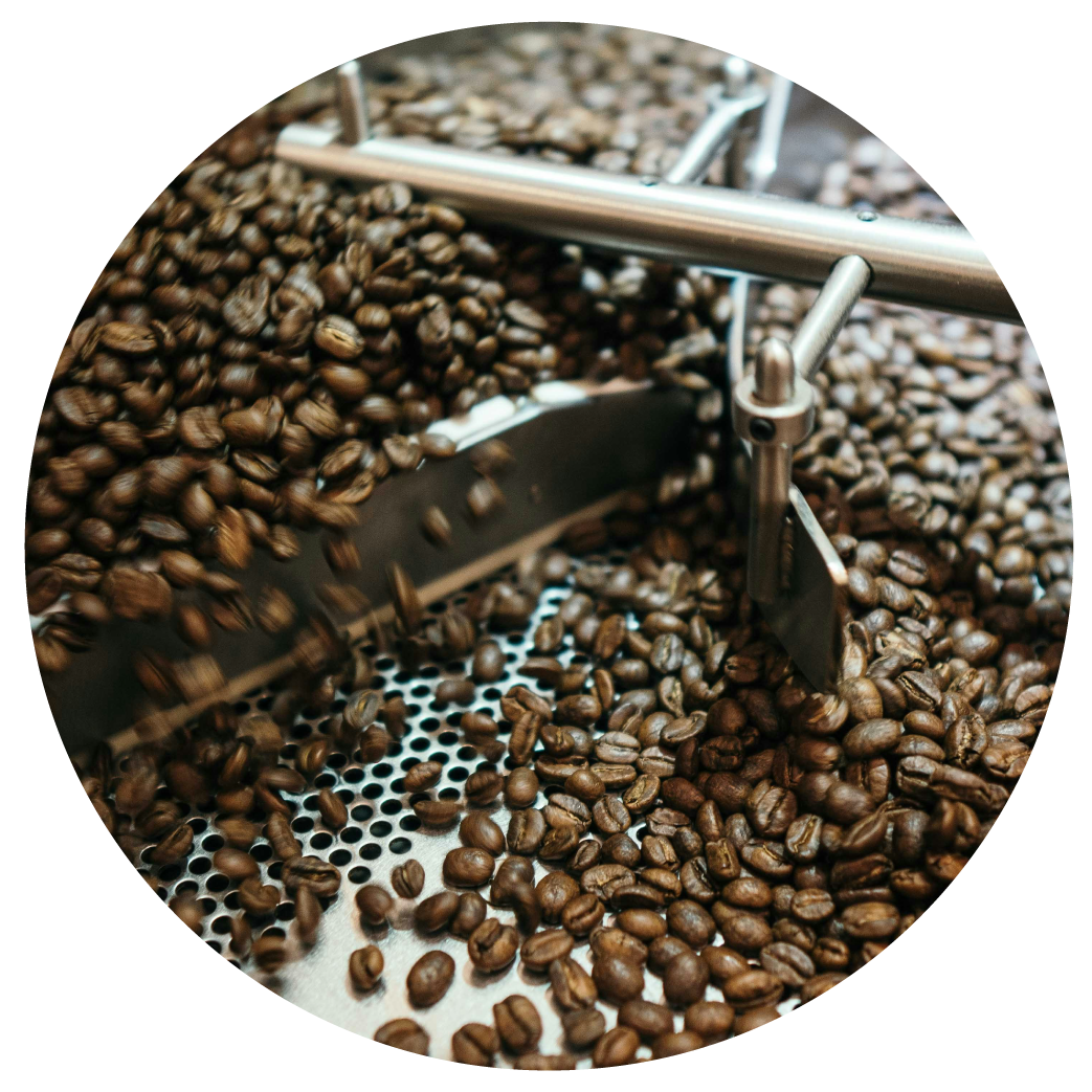 Coffee beans roasting in motion—avercasso helps roasters ensure consistent quality from the green bean source