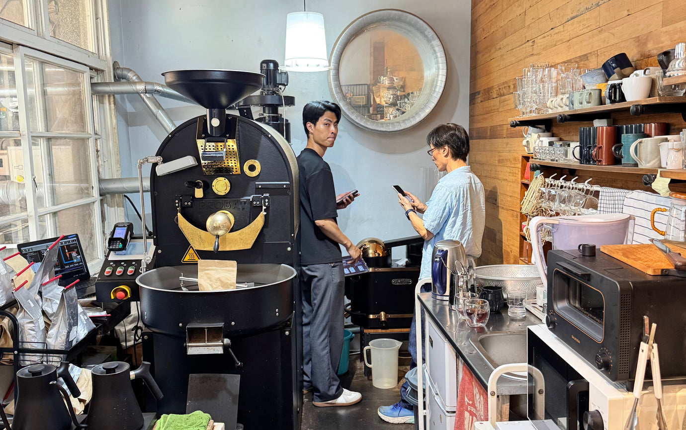 An avercasso sales representative demonstrating the operation of the AI coffee bean sorter to a client after installation, ensuring a smooth transition to a smart bean sorting solution.