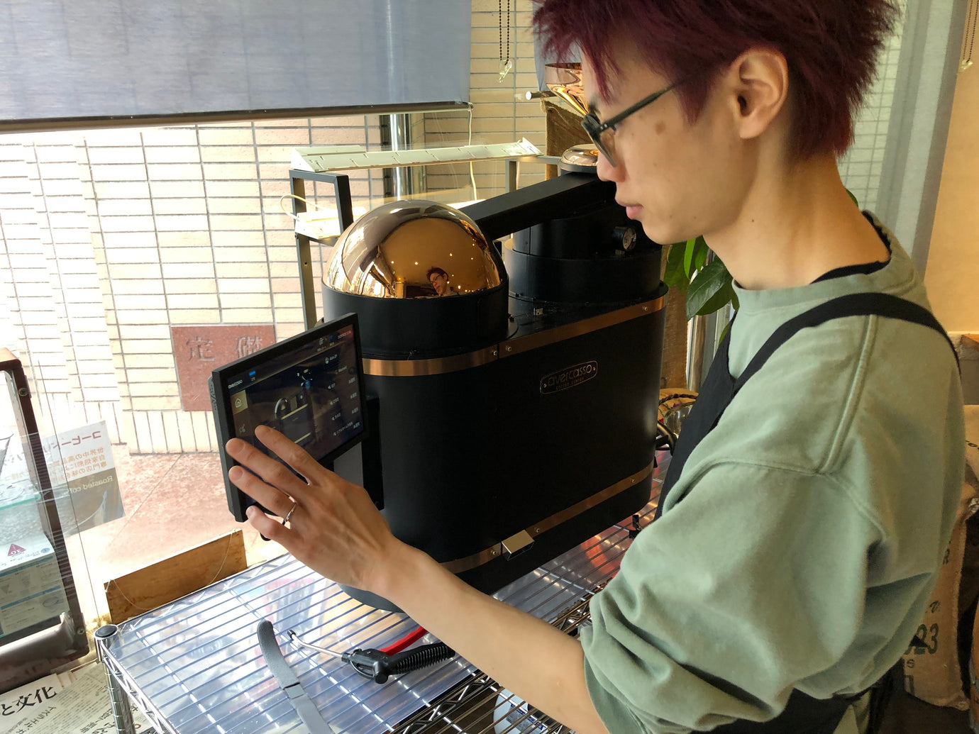 SHANGS Cafe in Tokyo uses AI sorting to catch insect- and fungus-damaged beans, improving consistency and lowering labor costs.